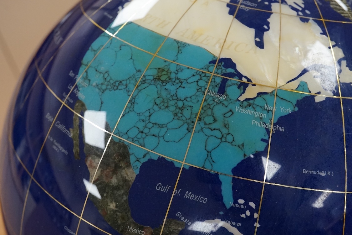 A large table top hardstone overlaid globe, 62cm high